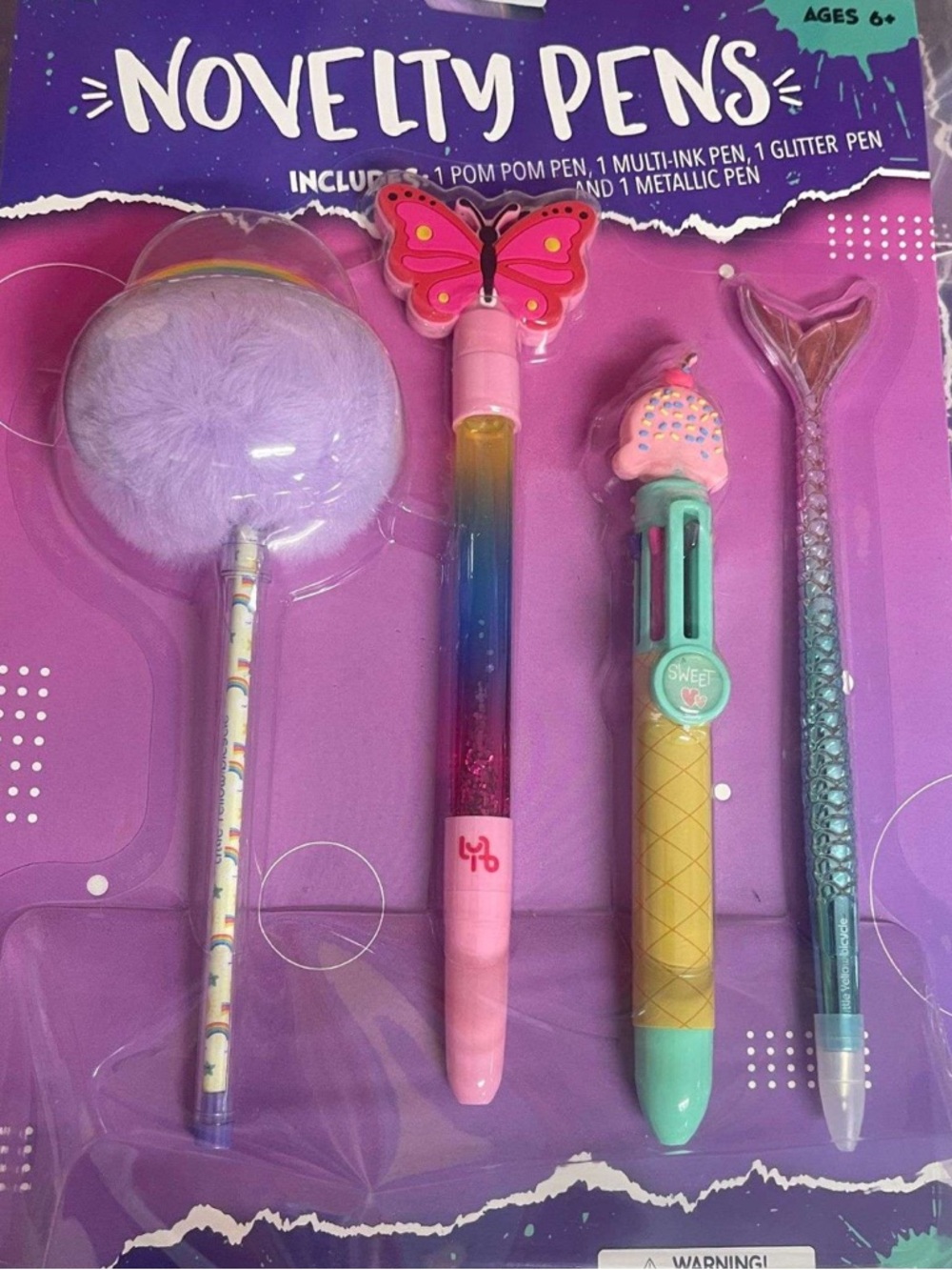 1- pack of Novelty Pens. (4 pens in the pack)